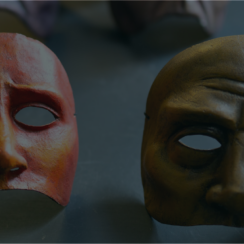 A close up of two masks