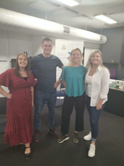 Our Artistic Director, Andy, and Practitioner Team Manager, Emma, with colleagues in Australia